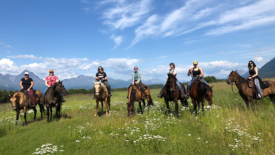 VCA Far Country team riding horses